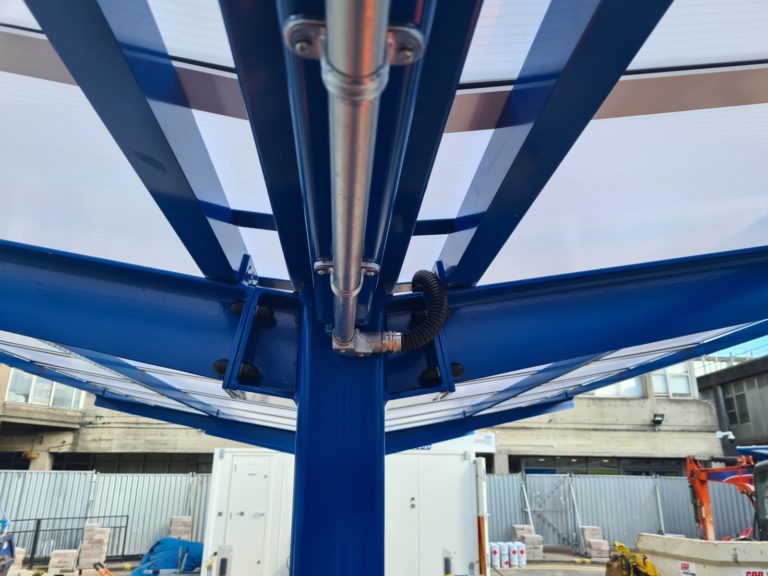 Galvanised conduit and flexible metal conduit fitted centre on the canopy.