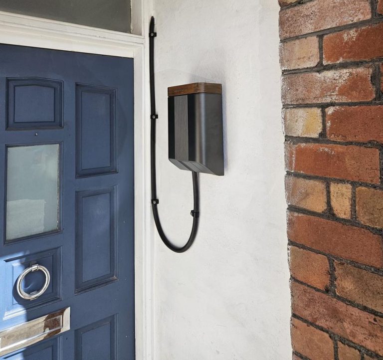 Untethered charger with walnut lid, set into the porch reveal