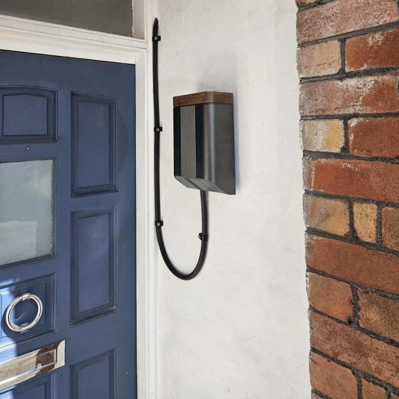 Untethered charger with walnut lid, set into the porch reveal